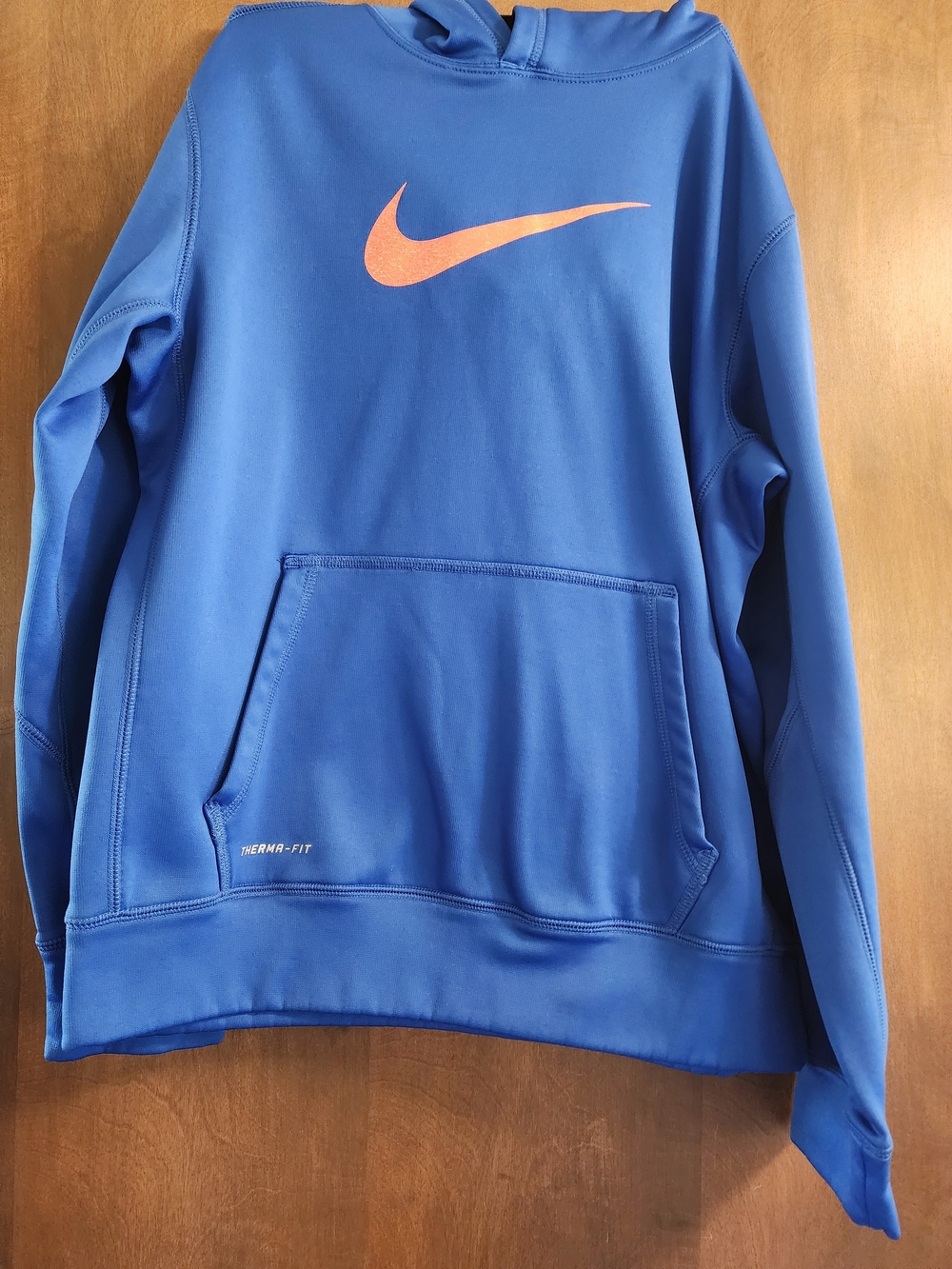 Nike Kids' Blue Therma-Fit Hoodie with Orange Swoosh